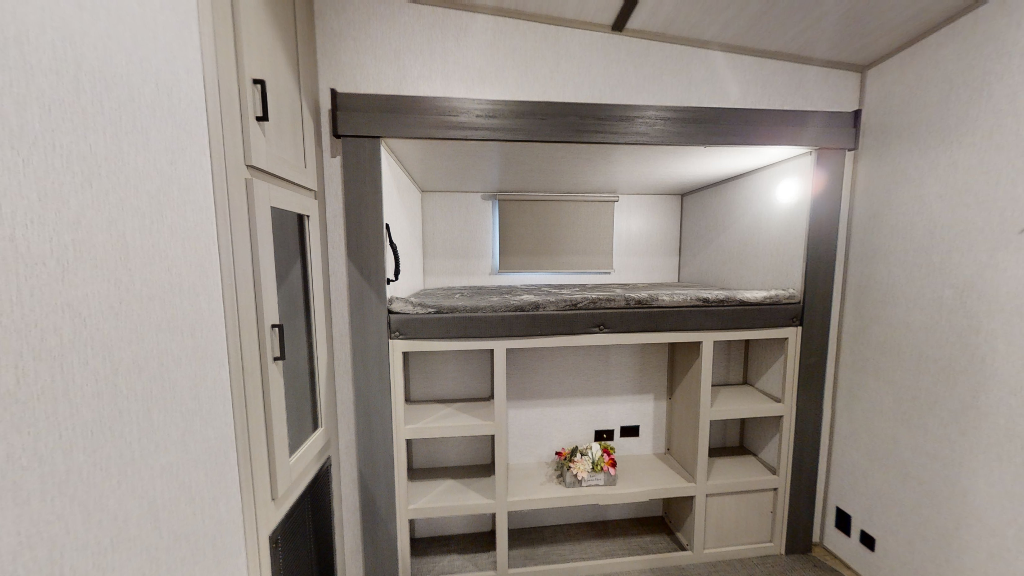 Bunk room with extra storage.