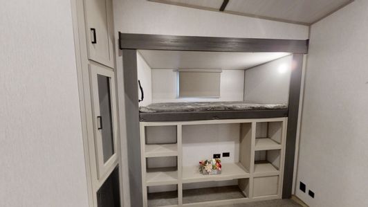 Bunk room with extra storage.